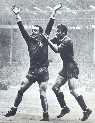 St John celebrates his cup final goal with Roger Hunt