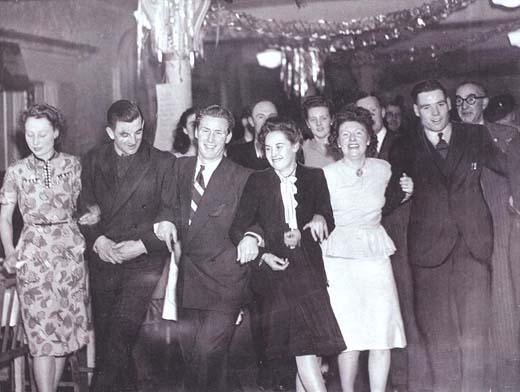The Liverpool team and their wives dancing the night away after Liverpool's championship's win in 1947