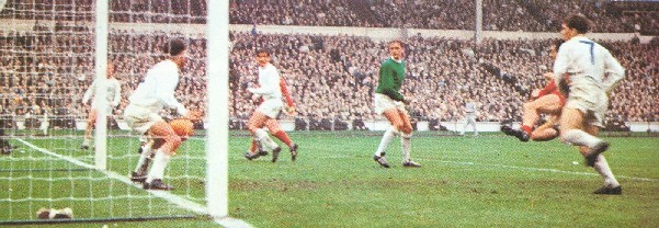St John heads in the winning goal at Wembley